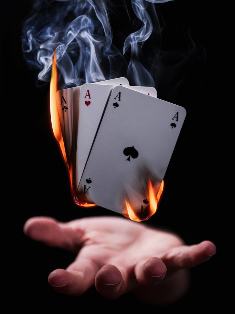 playing cards on fire